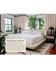 Modern bedroom with a bed, nightstands, and decorative elements.