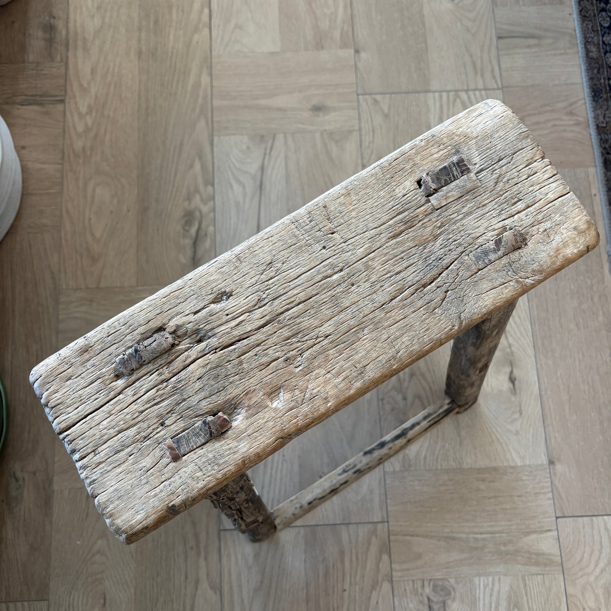 Wooden stool on a wooden floor