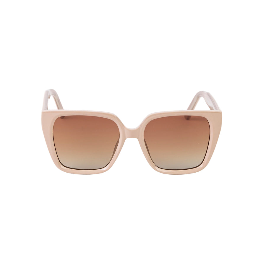 Beige sunglasses with gradient lenses on a white background