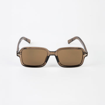 Sunglasses with brown lenses and transparent frame on a white background