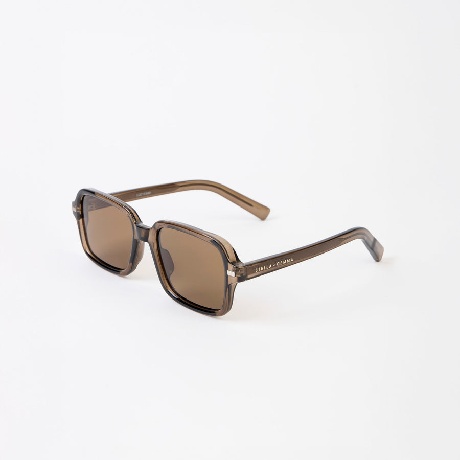 Sunglasses with brown gradient lenses on a white background