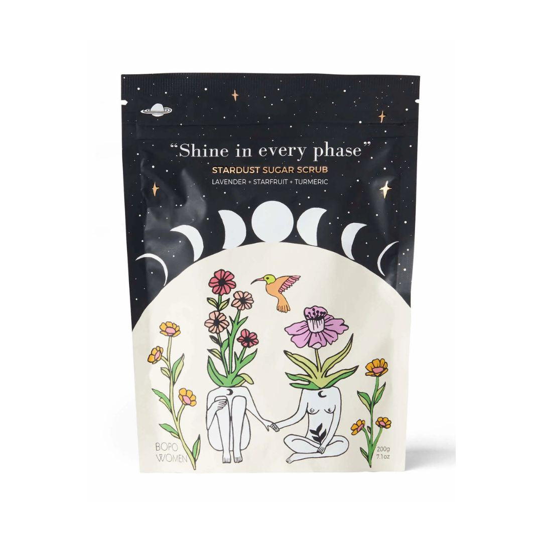 Stardust sugar scrub packaging with celestial design and text 'Shine in every phase'.