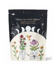 Stardust sugar scrub packaging with celestial design and text 'Shine in every phase'.