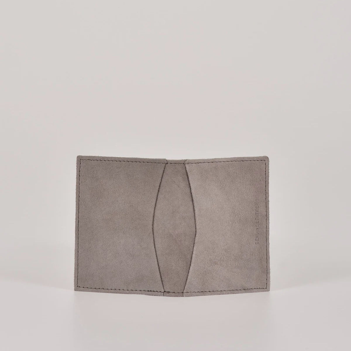 Gray cardholder on a light gray background