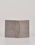 Gray cardholder on a light gray background