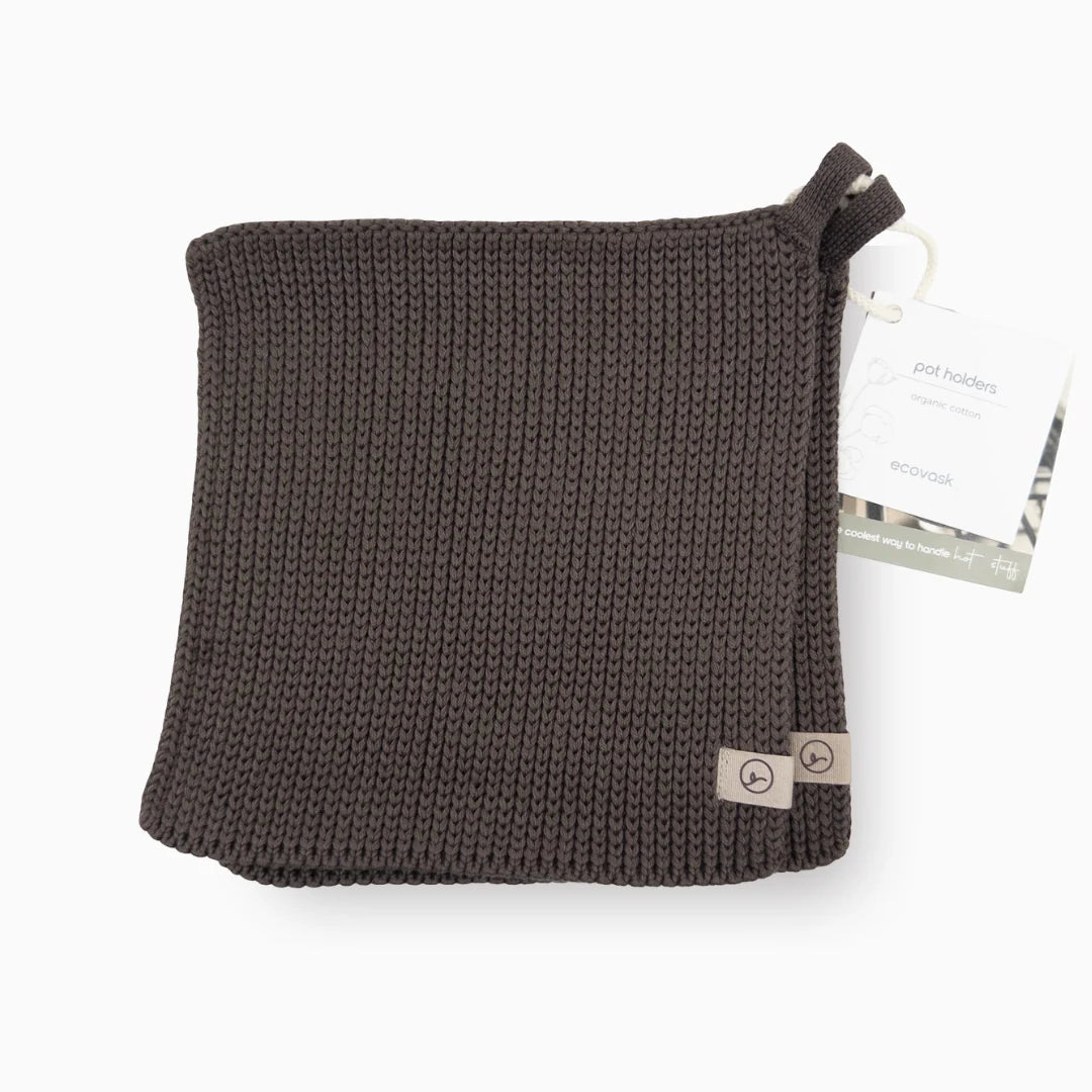 Brown knitted pouch with a brand tag on a white background