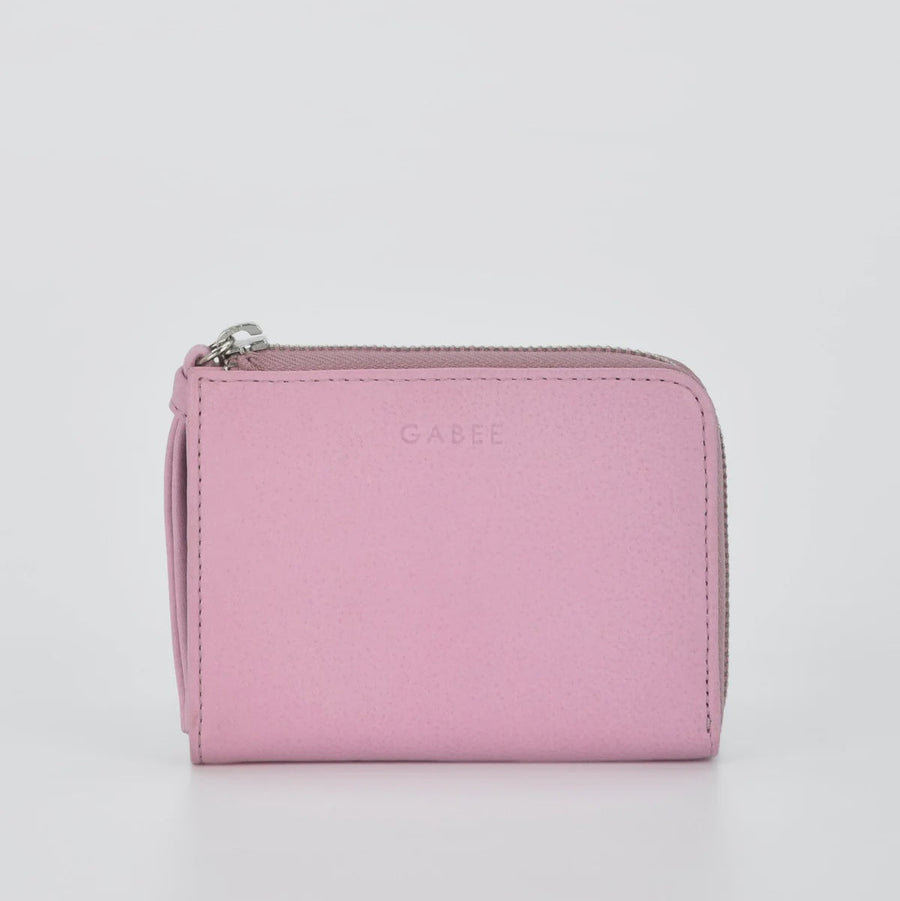 Pink wallet with 'GABEE' branding on a light gray background