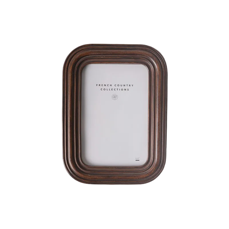 Wooden picture frame on a white background