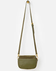 An olive green crossbody bag with a matching adjustable shoulder strap and gold-tone hardware, shown against a plain light gray background.