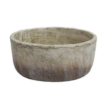 Round concrete planter on a white background