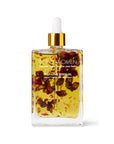 Bottle of self-love body oil with floral elements on a white background