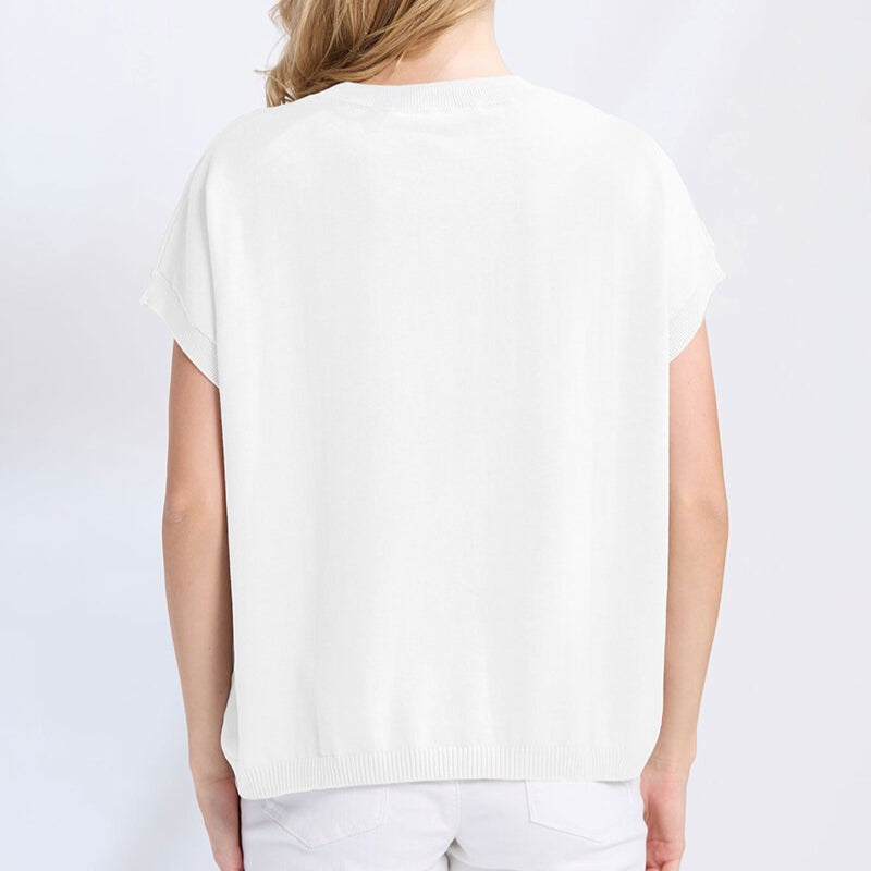 Person wearing a white t-shirt and pants on a plain background