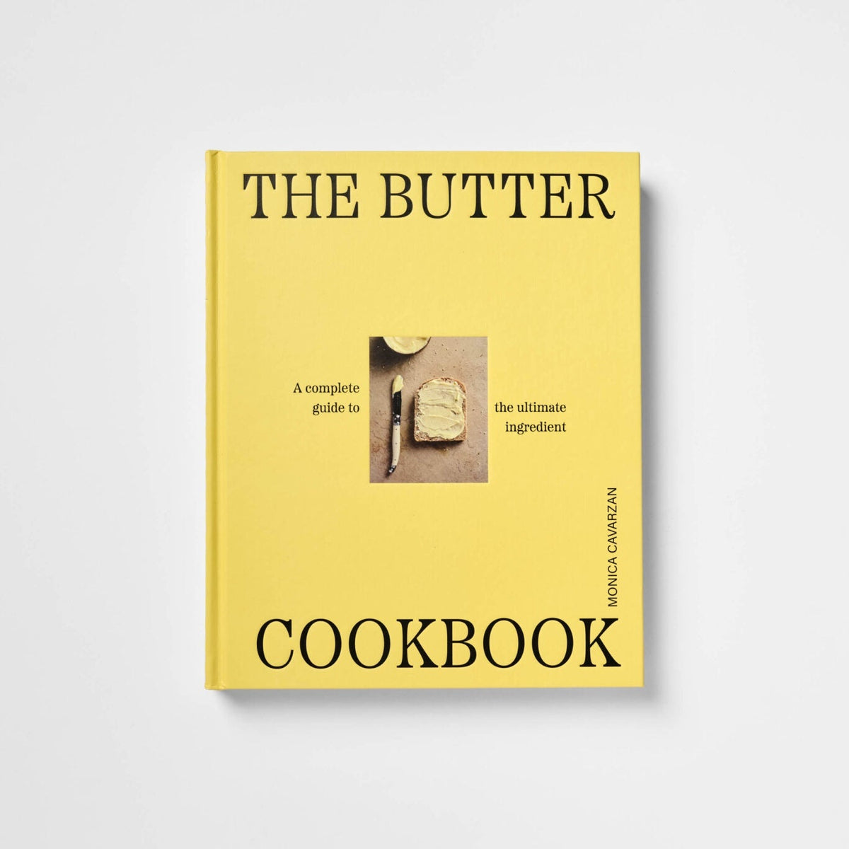 The Butter Cookbook by Sheila Gardner, featuring a bright yellow cover with black text and a small central photograph of a buttered bread slice, shown on a light gray background.
