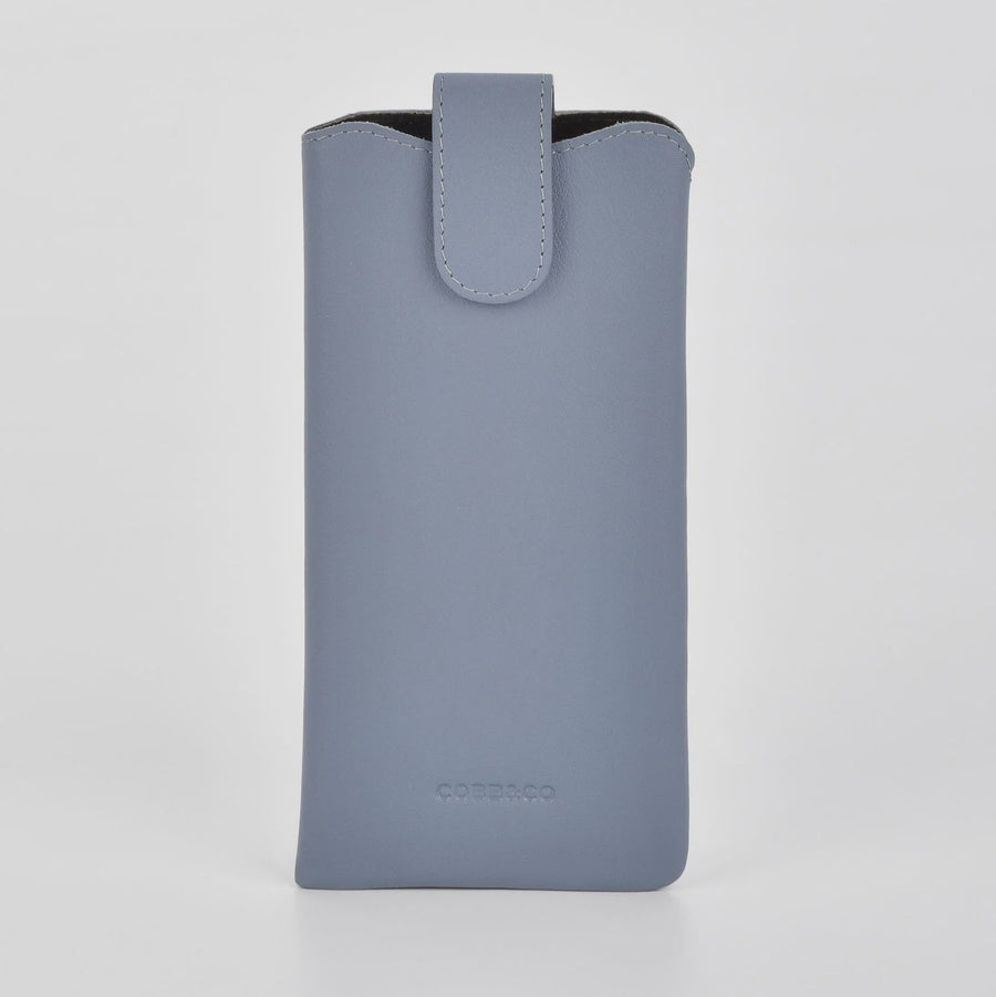 Gray phone case with a black interior on a light gray background