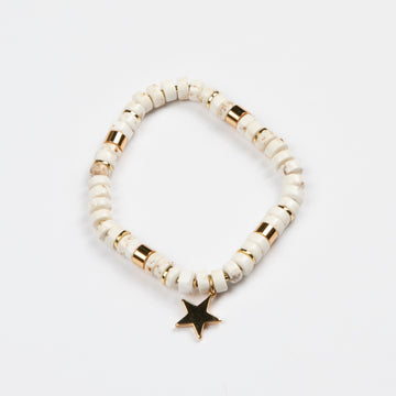 Howlite stretch bracelet in cream and gold with gold star pendant by Stella + Gemma