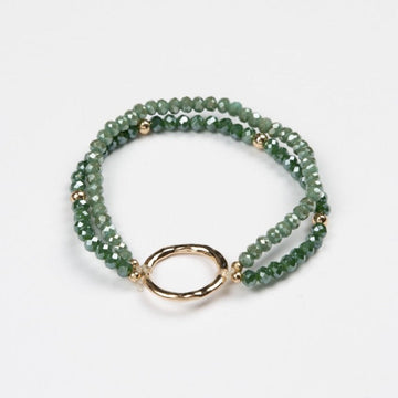 Emerald green bracelet with gold circle accent by Stella + Gemma