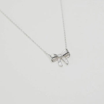 Stella + Gemma Bow Necklace - Silver by Stella and Gemma